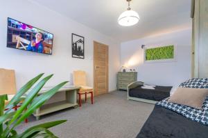 Posedenie v ubytovaní APARTAMENT NAD KAMIEŃCZYKIEM IV