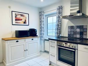 Kuchyň nebo kuchyňský kout v ubytování Ferienwohnung CURB