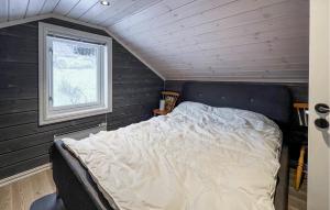 Postel nebo postele na pokoji v ubytování Moderne Hytte Midt I Skibakken