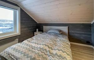 Postel nebo postele na pokoji v ubytování Moderne Hytte Midt I Skibakken