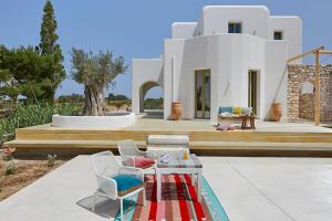 a villa with a view of a house at OceanLight Horizon - luxury Villa with private pool in Nea Cryssi Akti