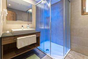 Koupelna v ubytování Hotel Garni Pfeifer + 37 fotografií
