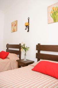Кровать или кровати в номере RVHotels Apartamentos Villas Piscis