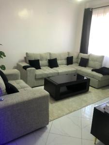 Posezení v ubytování Rura Homes