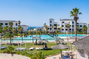 a view of the pool at the resort at Luxury penthouse with ocean views in Estepona