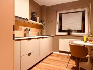 Η κουζίνα ή μικρή κουζίνα στο Modernes Design-Apartment in Hünxe