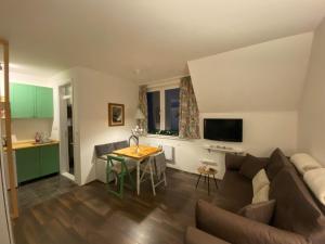 Uma televisão e/ou sistema de entretenimento em Apartman Jin