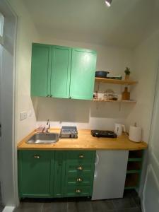 Eldhús eða eldhúskrókur á Apartman Jang