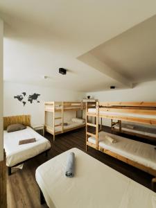 Posteľ alebo postele v izbe v ubytovaní Surf&Sleep