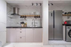 Η κουζίνα ή μικρή κουζίνα στο PSN - Apartamentos proximos da praia de cabeçudas