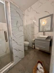 Koupelna v ubytování Beachtown Luxury Villas Apt 101