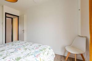 La maison du Bout du Monde, Jacuzzi, Climatisation, 4 chambres, Plage à 600M et Phare à 1Km客房内的一张或多张床位