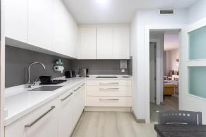 Kuchyňa alebo kuchynka v ubytovaní Spacious apartment in El Campello, 120 m², shared pool