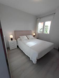Posteľ alebo postele v izbe v ubytovaní Spacious apartment in El Campello, 120 m², shared pool + 35 fotografií