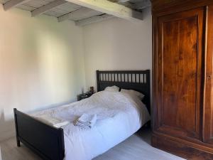 Postel nebo postele na pokoji v ubytování Chez Ashley