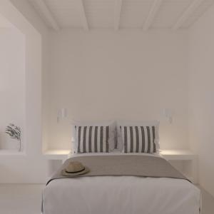 Ένα ή περισσότερα κρεβάτια σε δωμάτιο στο Carpe Diem Santorini