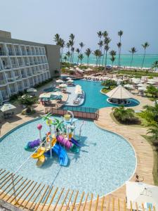 an overhead view of a pool at a resort at Maragogi Brisa Exclusive Hotel in Maragogi