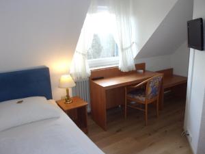 Postel nebo postele na pokoji v ubytování Hotel Fährhaus