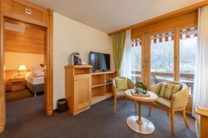 TV a/nebo společenská místnost v ubytování SALZANO Hotel - Spa - Restaurant