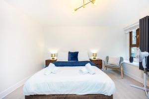 Ένα ή περισσότερα κρεβάτια σε δωμάτιο στο Stylish 1 Bedroom Retreat in North London