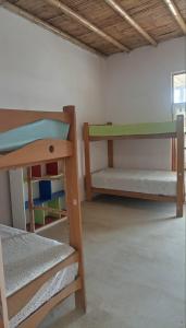 Postel nebo postele na pokoji v ubytování Punta Vichayo - Casa Ballenas