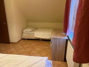 Postel nebo postele na pokoji v ubytování HS Hotel