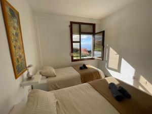 Postel nebo postele na pokoji v ubytování El Mirador de El Paso - Vistas y piscina + 37 fotografií