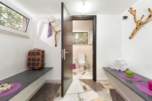 Kúpeľňa v ubytovaní Elefteria Apts & Suites