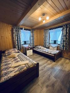 Postel nebo postele na pokoji v ubytování Chata na Grapie