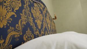 A bed or beds in a room at Baglio Sant’Angelo