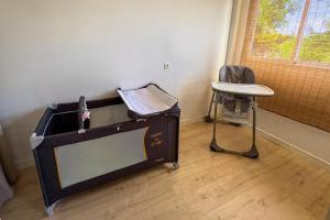 Postel nebo postele na pokoji v ubytování La Kaz'Alice