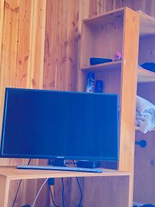 TV a/nebo společenská místnost v ubytování Casa del bosque