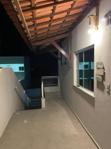 Un balcon sau o terasă la Suítes Paraíso Perfeito