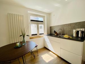 Η κουζίνα ή μικρή κουζίνα στο HafenCity App No 5 +9 φωτογραφίες