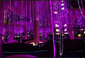 a bunch of purple lights hanging from a ceiling at ARTEplus JALAN AMPANG KLCC in Kuala Lumpur +99 photos