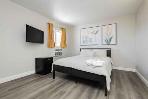 Postel nebo postele na pokoji v ubytování G Hotel
