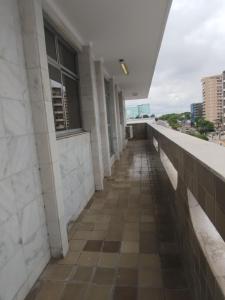 a walkway on the roof of a building at Slaass flat in Manaus