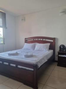 Ένα ή περισσότερα κρεβάτια σε δωμάτιο στο Gualanday Apartamento Valle del Lili