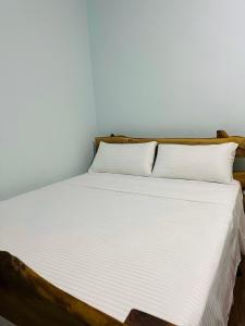 Postel nebo postele na pokoji v ubytování Korca Central Apartment + 11 fotografií