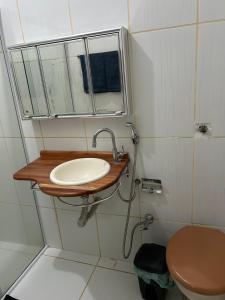 Baðherbergi á Suite dos anjos