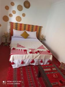 Postel nebo postele na pokoji v ubytování Riad rajad Marrakech