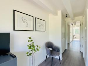 Χώρος καθιστικού στο Ferienwohnung FischerLoft im Haus Hiddensee Prora