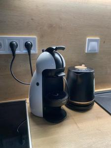 a coffee maker sitting on top of a counter at Your Home 7 with parking in Myslava