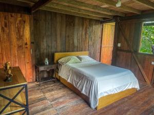 Postel nebo postele na pokoji v ubytování Casa Nutria