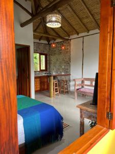 Ένα ή περισσότερα κρεβάτια σε δωμάτιο στο Bangalô do Lago