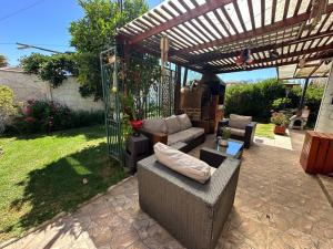 Un jardín fuera de Cabañas Sal y Arena El Quisco Norte