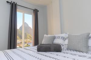 Postelja oz. postelje v sobi nastanitve Caldera Villas