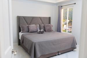 Postelja oz. postelje v sobi nastanitve Caldera Villas