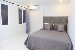 Postelja oz. postelje v sobi nastanitve Caldera Villas