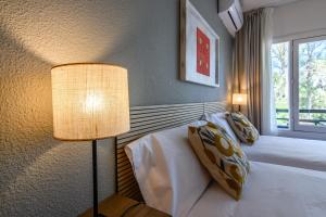 Postel nebo postele na pokoji v ubytování Hotel Don Diego by Ĥ